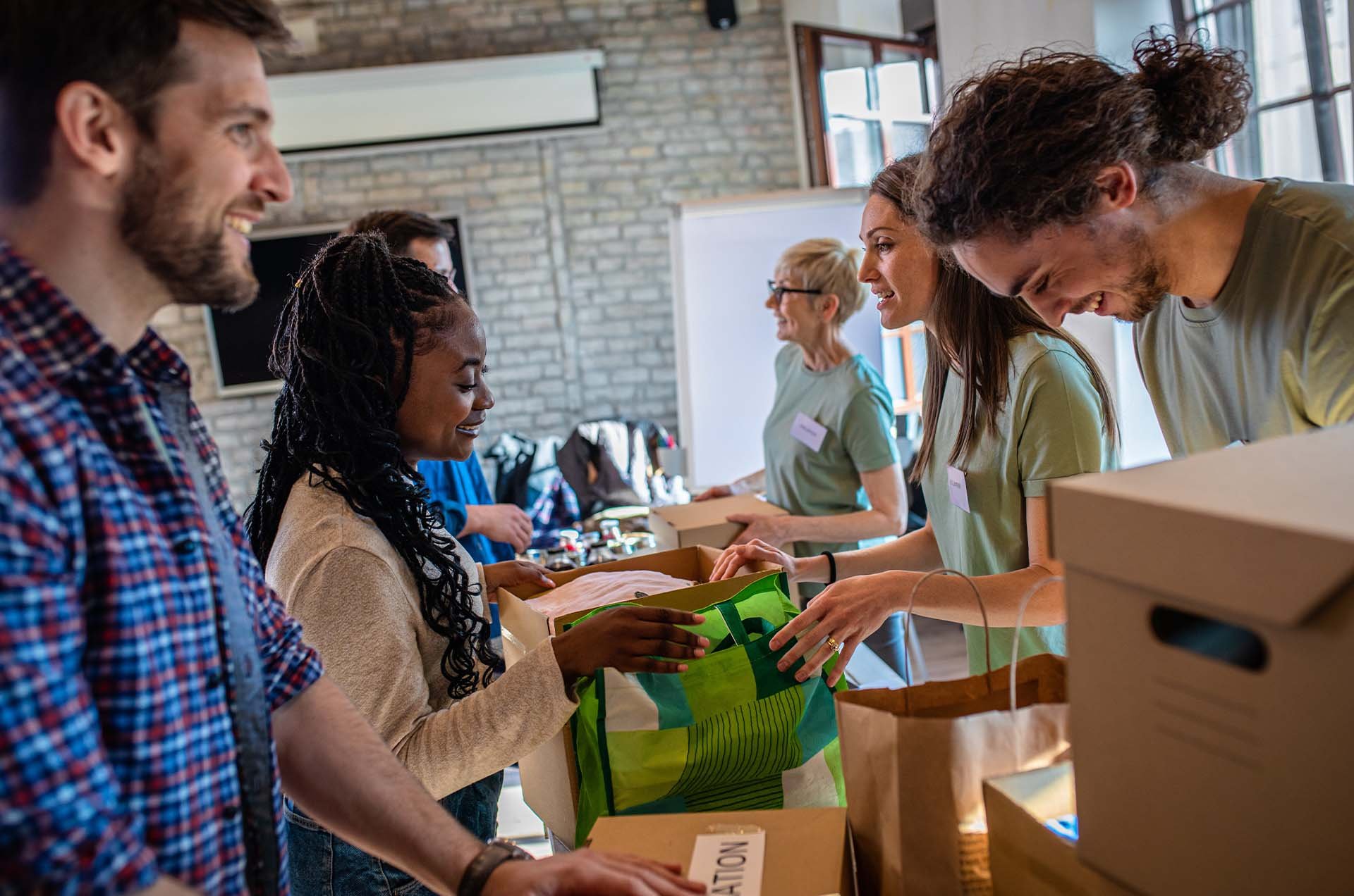 PMIG-volunteers-stewarding-charity-donations