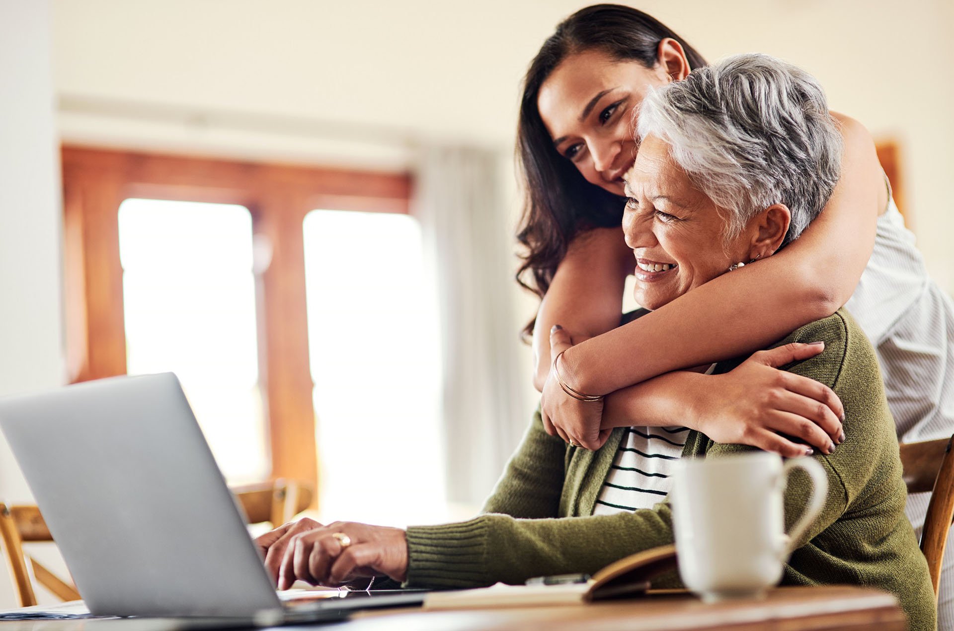 woman-hugging-elder-mother