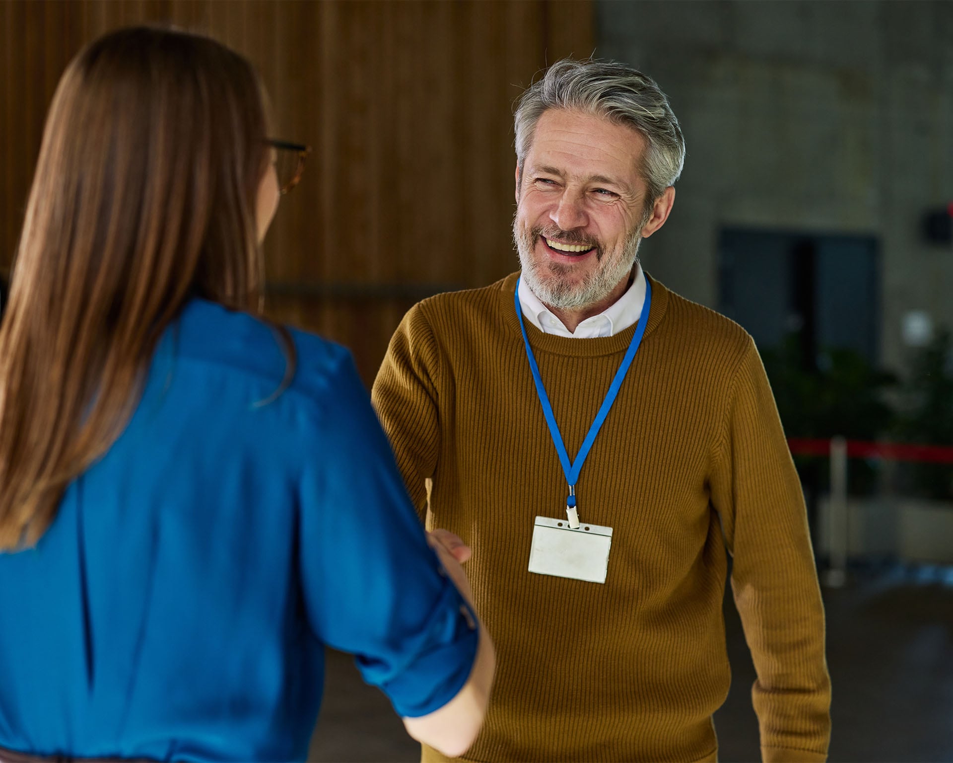 insurance-representative-warmly-greeting-client